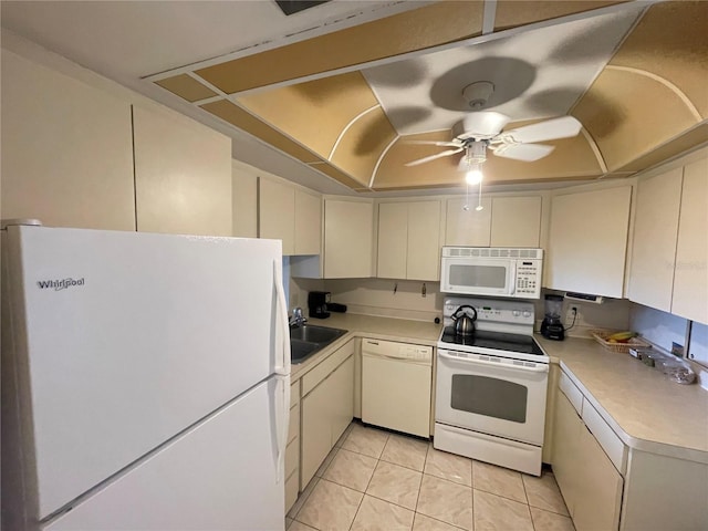 kitchen with light tile patterned flooring, ceiling fan, a sink, white appliances, and light countertops
