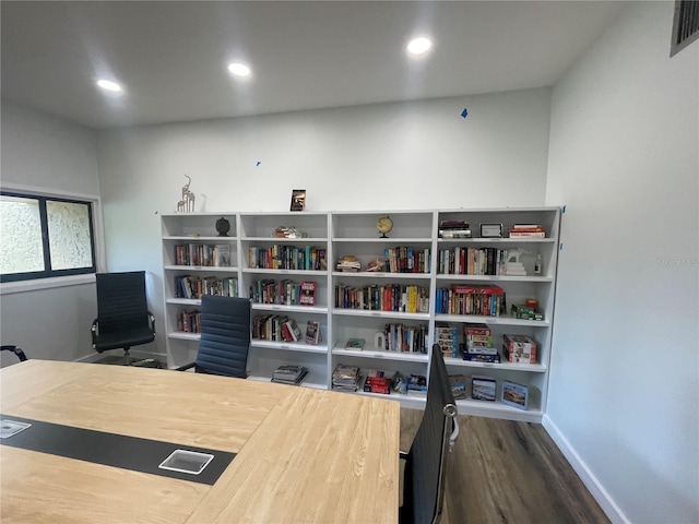 office area with baseboards, recessed lighting, wood finished floors, and visible vents
