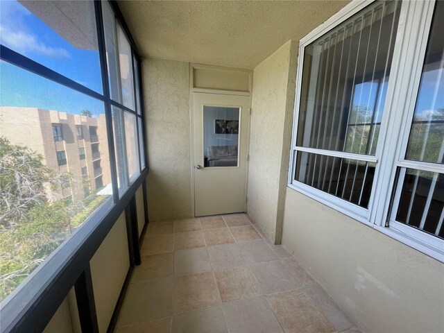 2615 Cove Cay Dr Unit 408, Clearwater, FL 33760 - unfurnished sunroom featuring plenty of natural light