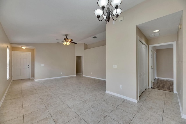 spare room featuring visible vents, baseboards, ceiling fan with notable chandelier, and light tile patterned floors