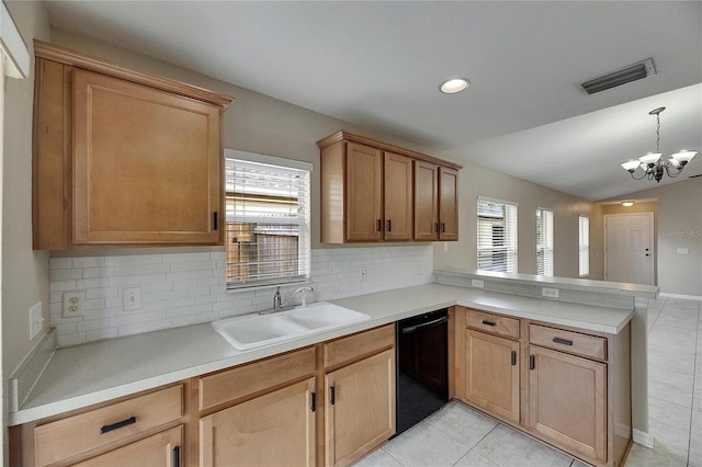 kitchen with visible vents, a peninsula, black dishwasher, tasteful backsplash, and a sink