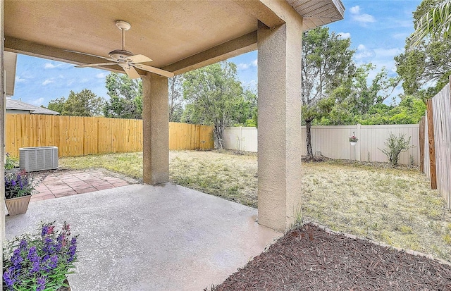 view of patio / terrace with central air condition unit, ceiling fan, and a fenced backyard