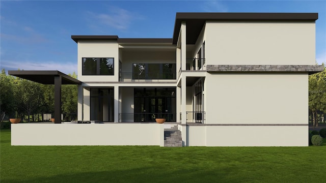 602 Channel Dr, Tampa, FL 33606 - back of house with a balcony, stucco siding, and a yard