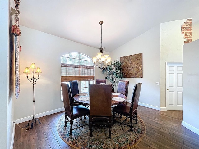 5058 Westlake Blvd, Dade City, FL 33523 - dining room featuring a chandelier, dark wood-type flooring, lofted ceiling, and baseboards