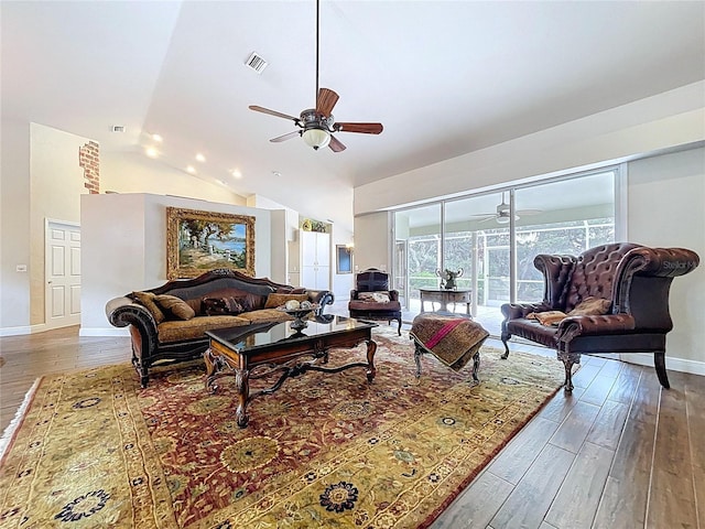 5058 Westlake Blvd, Dade City, FL 33523 - living area with ceiling fan, light wood-style flooring, lofted ceiling, and baseboards