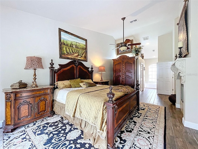 5058 Westlake Blvd, Dade City, FL 33523 - bedroom with wood finished floors, baseboards, and vaulted ceiling