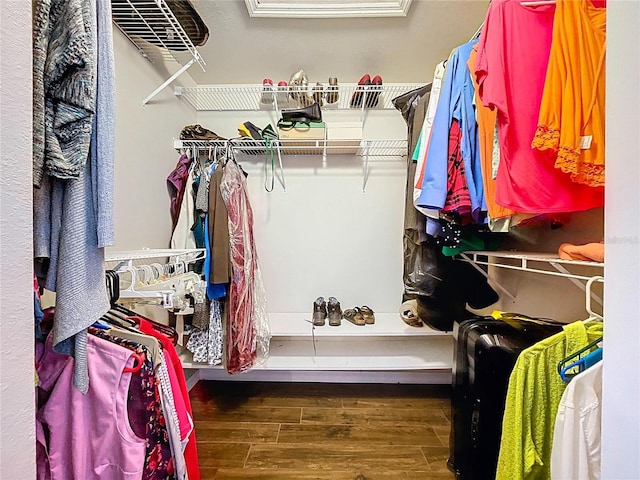 5058 Westlake Blvd, Dade City, FL 33523 - spacious closet featuring wood finished floors