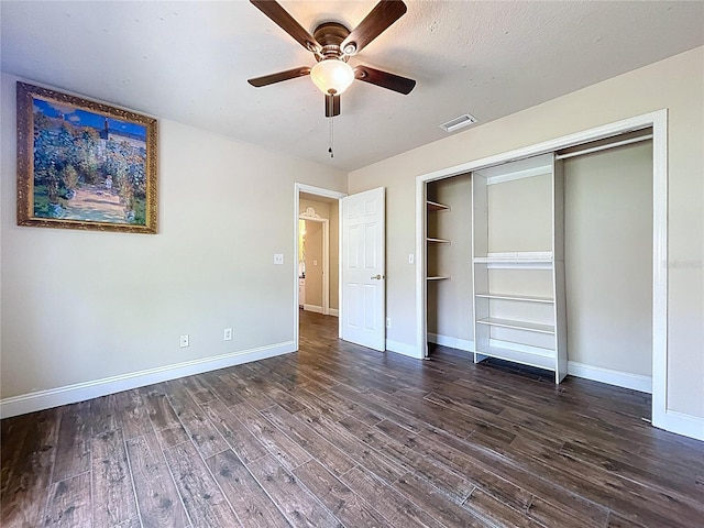 5058 Westlake Blvd, Dade City, FL 33523 - unfurnished bedroom featuring baseboards, wood finished floors, a closet, and ceiling fan
