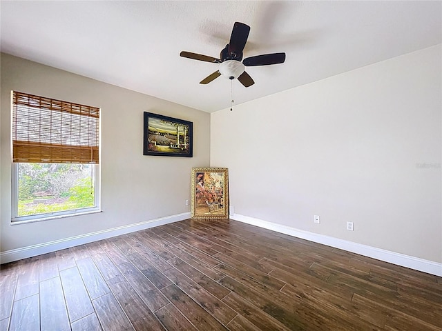 5058 Westlake Blvd, Dade City, FL 33523 - empty room featuring dark wood-type flooring, baseboards, and a ceiling fan