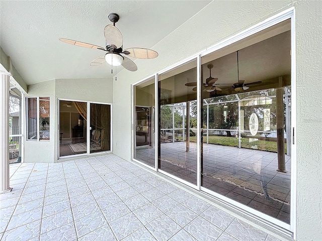 5058 Westlake Blvd, Dade City, FL 33523 - unfurnished sunroom with ceiling fan, lofted ceiling, and plenty of natural light