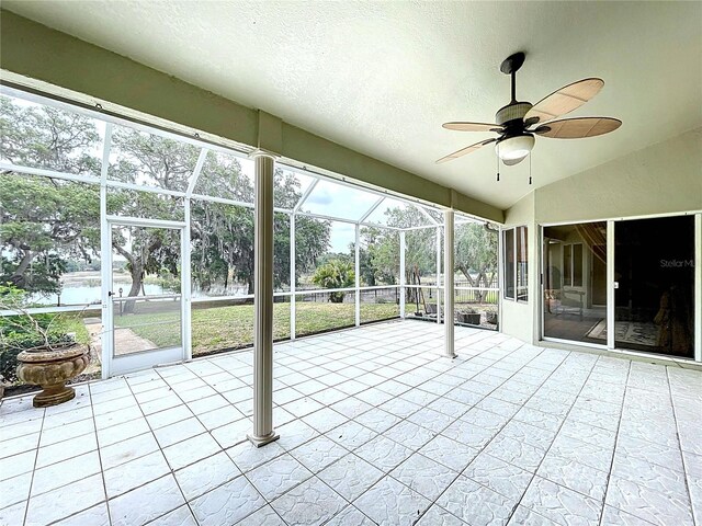 5058 Westlake Blvd, Dade City, FL 33523 - unfurnished sunroom featuring ceiling fan and vaulted ceiling