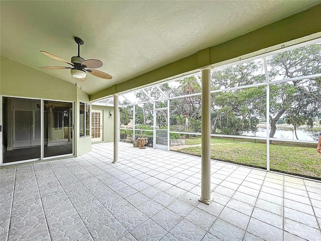 5058 Westlake Blvd, Dade City, FL 33523 - unfurnished sunroom featuring a ceiling fan, vaulted ceiling, and plenty of natural light