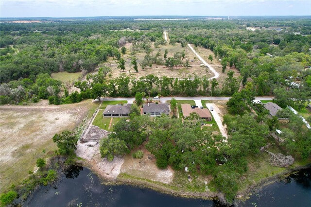 5058 Westlake Blvd, Dade City, FL 33523 - aerial overview of property's location with a forest and a large body of water