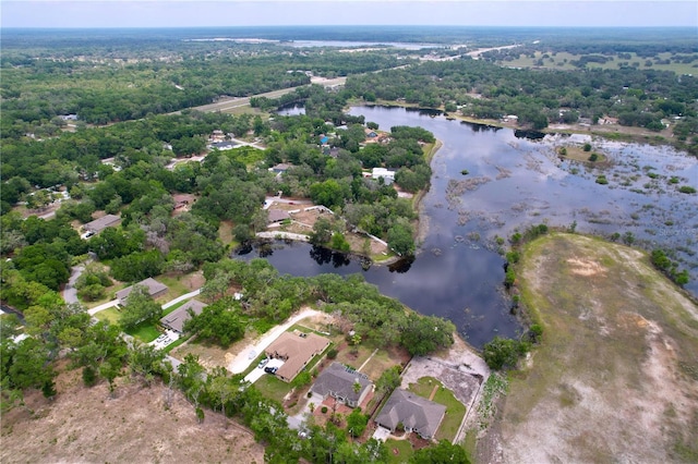 5058 Westlake Blvd, Dade City, FL 33523 - aerial overview of property's location featuring a nearby body of water and a heavily wooded area