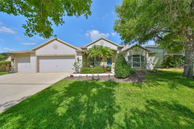 single story home with a garage, stucco siding, concrete driveway, and a front yard