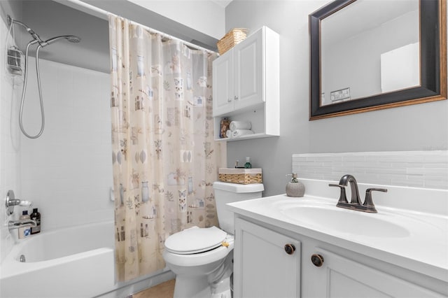 bathroom featuring vanity, shower / bathtub combination with curtain, and toilet