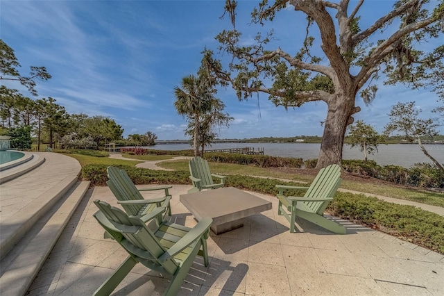view of patio featuring a water view