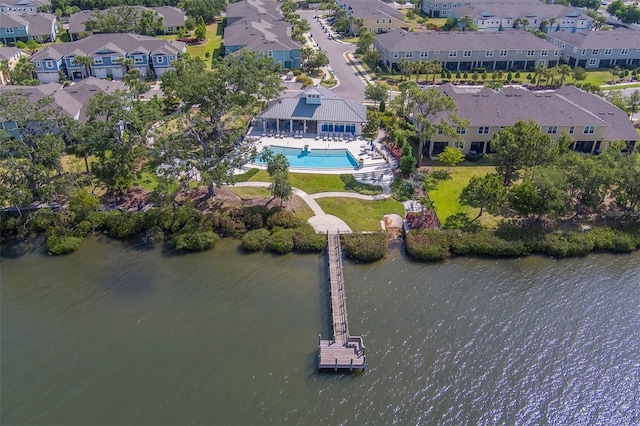 birds eye view of property featuring a residential view and a water view