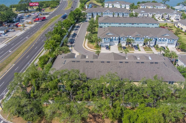 birds eye view of property with a residential view