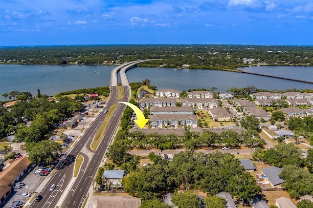 aerial view with a residential view and a water view