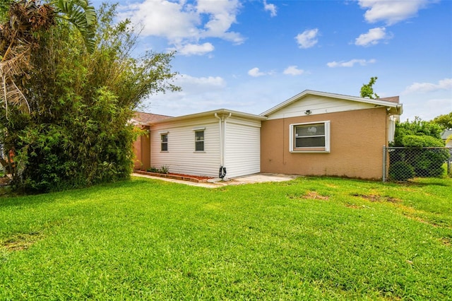 8225 Medford Dr, Port Richey, FL 34668 - rear view of house featuring stucco siding