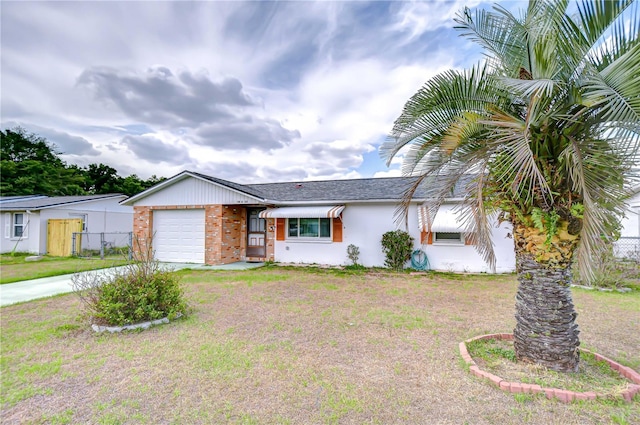 ranch-style house with driveway, a front yard, a garage, brick siding, and fence