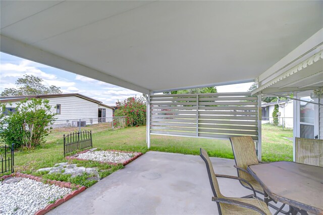 view of patio with fence