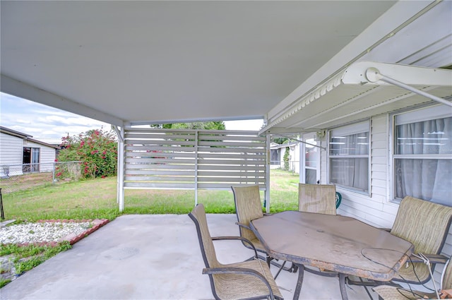 view of patio / terrace with fence and outdoor dining space