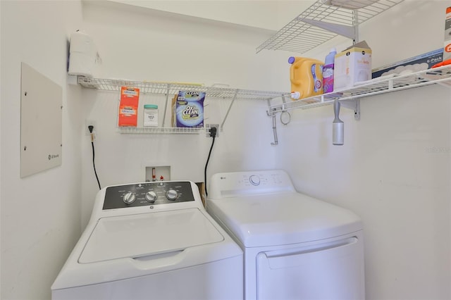 6332 35th Avenue Cir E, Palmetto, FL 34221 - laundry area featuring washer and clothes dryer and electric panel
