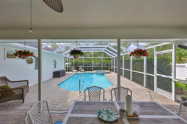 6332 35th Avenue Cir E, Palmetto, FL 34221 - view of pool with a patio, outdoor dining area, a pool with connected hot tub, and glass enclosure