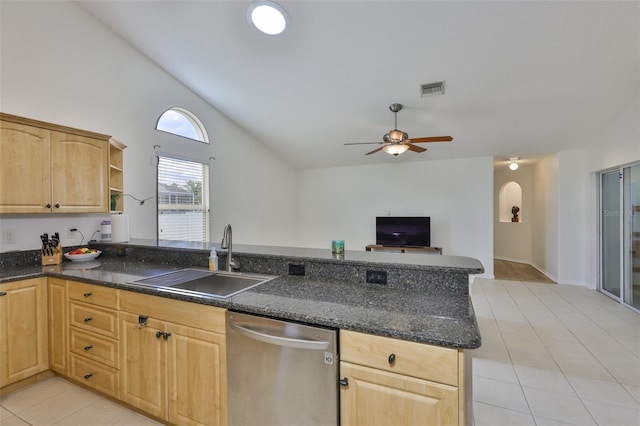 6332 35th Avenue Cir E, Palmetto, FL 34221 - kitchen with stainless steel dishwasher, a peninsula, light tile patterned floors, light brown cabinets, and lofted ceiling