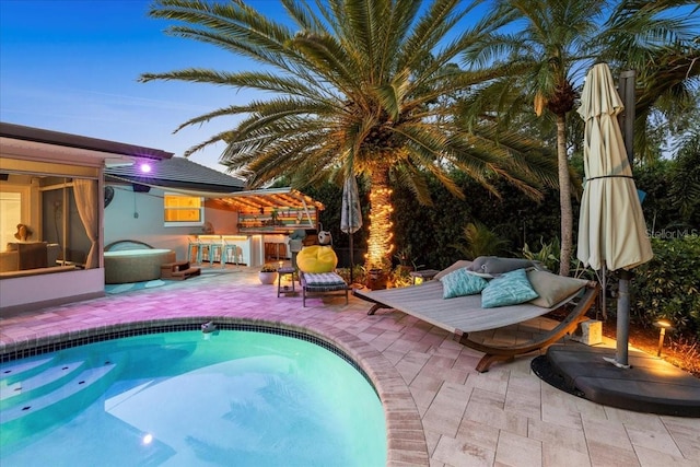 swimming pool featuring a patio