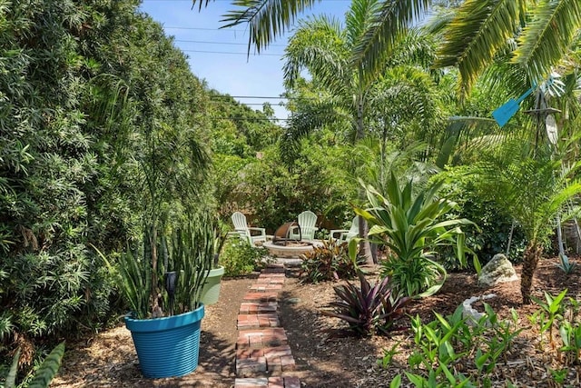 view of home's community featuring a fire pit