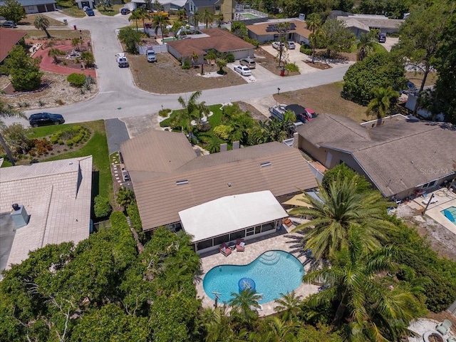 aerial perspective of suburban area with a pool area