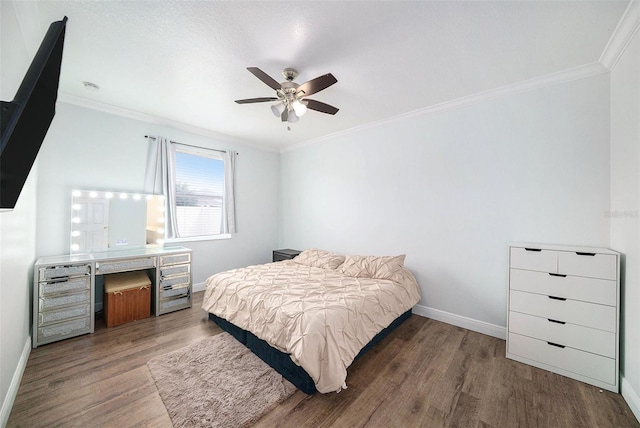 8407 Hunters Fork Loop, Ruskin, FL 33573 - bedroom featuring ceiling fan, wood finished floors, baseboards, and ornamental molding
