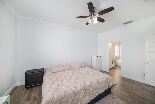 8407 Hunters Fork Loop, Ruskin, FL 33573 - bedroom with crown molding, baseboards, visible vents, and wood finished floors