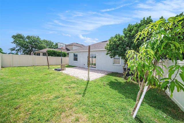 8407 Hunters Fork Loop, Ruskin, FL 33573 - view of yard featuring a patio area and a fenced backyard