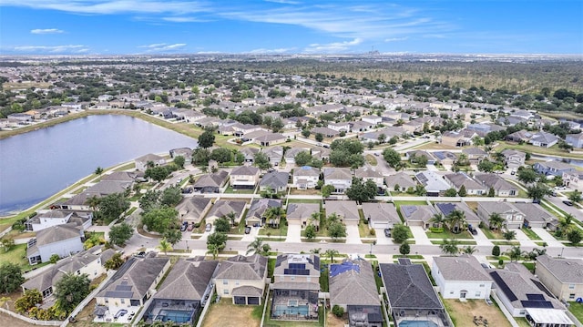 8407 Hunters Fork Loop, Ruskin, FL 33573 - aerial view featuring a water view and a residential view