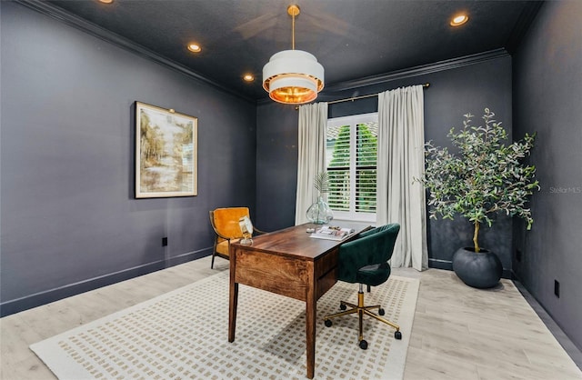 home office featuring baseboards, ornamental molding, and wood finished floors