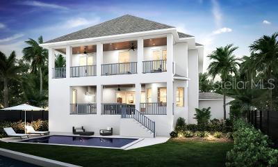 4 W Spanish Main St, Tampa, FL 33609 - back of house featuring a balcony, stucco siding, stairway, and a yard