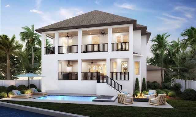4 W Spanish Main St, Tampa, FL 33609 - back of house with a ceiling fan, a balcony, stairs, and stucco siding
