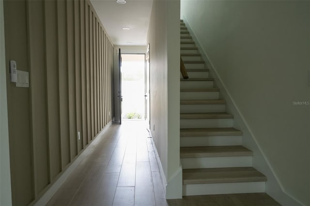 12484 Cross St, Largo, FL 33773 - stairway with wood finished floors and recessed lighting