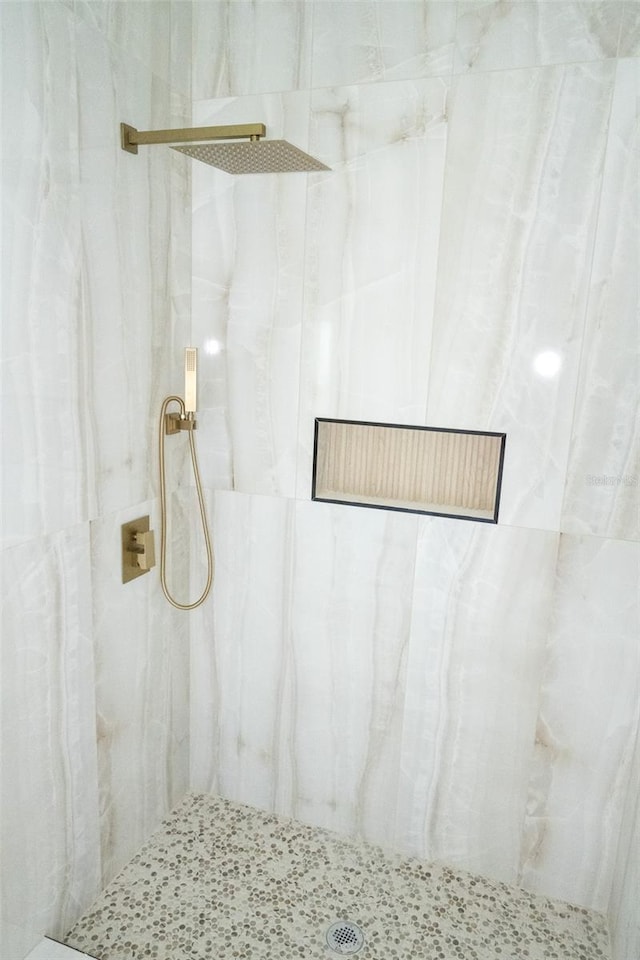12484 Cross St, Largo, FL 33773 - full bathroom featuring a tile shower