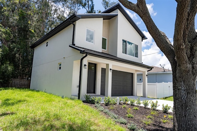 12484 Cross St, Largo, FL 33773 - view of front of home with an attached garage, stucco siding, and driveway