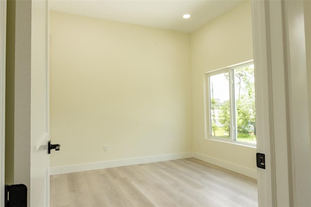 12484 Cross St, Largo, FL 33773 - unfurnished room featuring light wood-style floors and recessed lighting