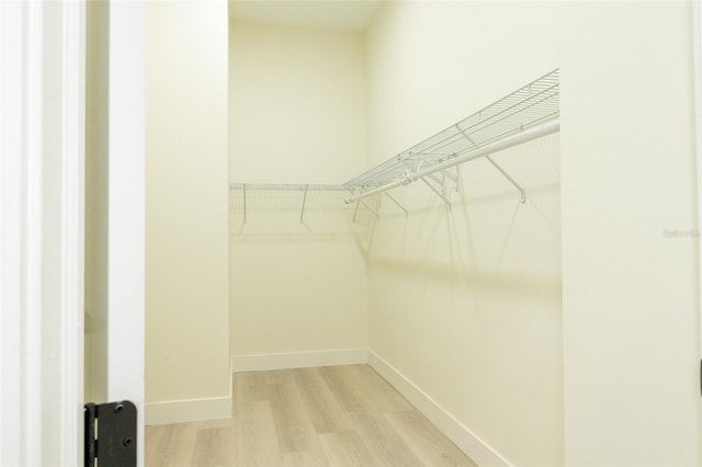 12484 Cross St, Largo, FL 33773 - spacious closet featuring light wood-type flooring