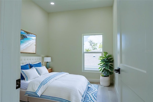 12484 Cross St, Largo, FL 33773 - bedroom with wood finished floors and recessed lighting