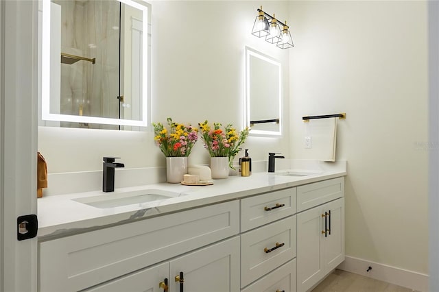 12484 Cross St, Largo, FL 33773 - bathroom featuring double vanity and an enclosed shower