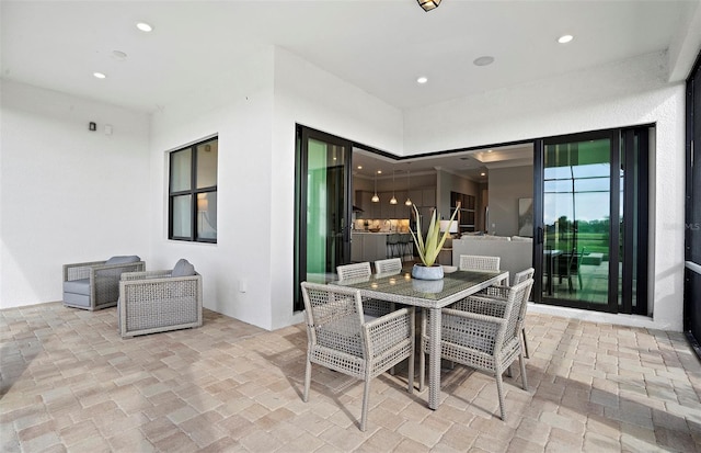 view of patio featuring outdoor dining space
