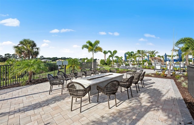 view of patio / terrace featuring fence